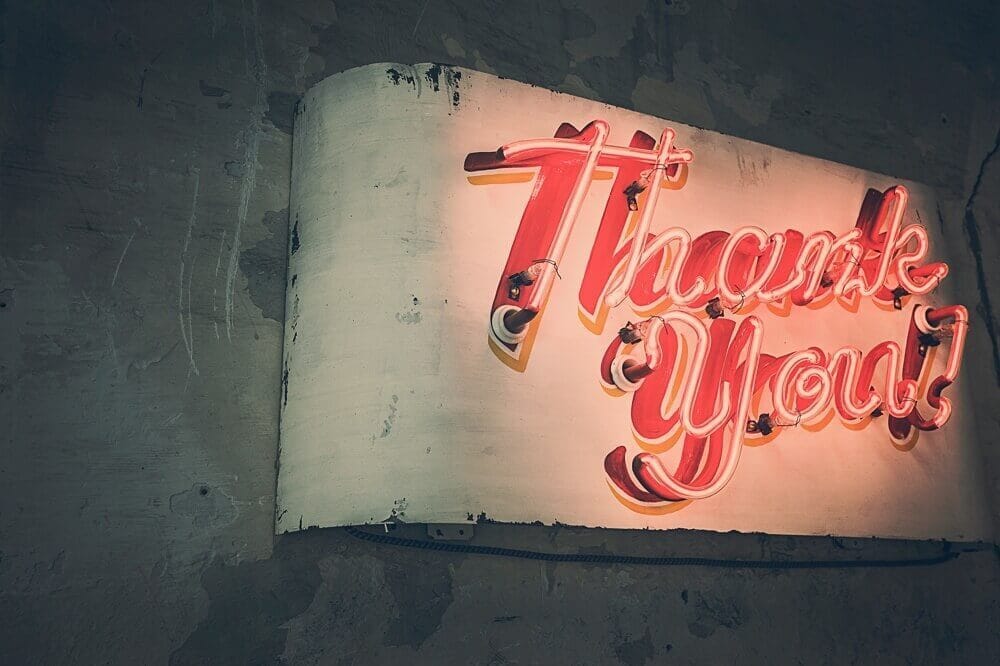 How to cooperate with SEO specialists - red neon sign saying thank you